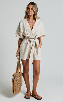 Kiro Playsuit - Linen Look V Neck Puff Sleeve Tie Waist Playsuit in Biscuit