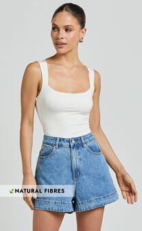 Rhianna Shorts - Mid Waist Recycled Denim Shorts in Mid Blue Wash