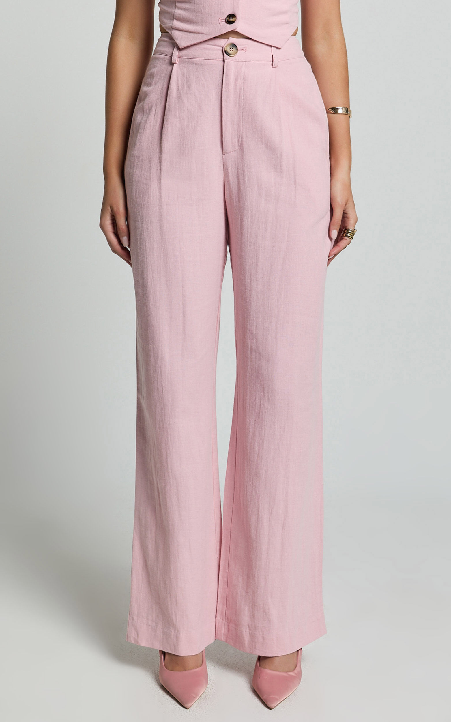 Baby pink flared trousers store
