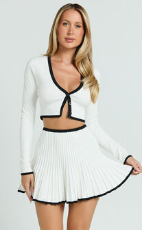 Naomi Two Piece Set - Contrast Knit Button Up Long Sleeve And Pleated Mini Skirt in Cream