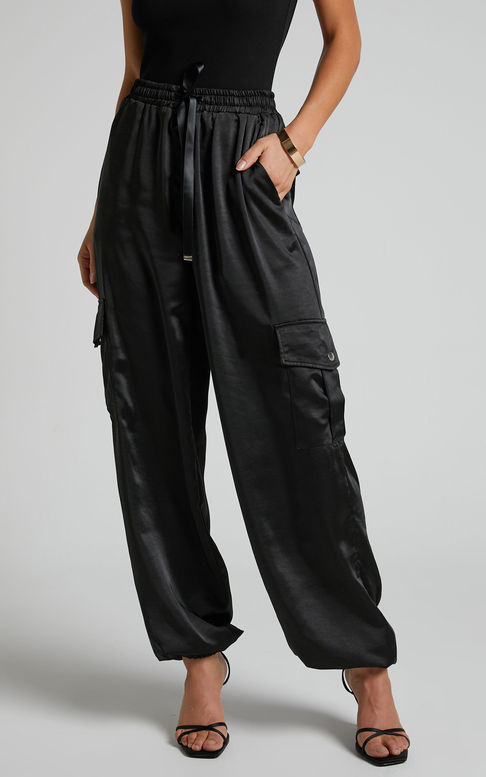 Jadeiah Pants Mid Rise Cargo Pocket Satin Jogger Pant in Black Showpo