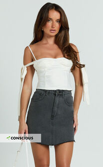 Adan Mini Skirt - Recycled Cotton Frayed Hem Denim Skirt in Black