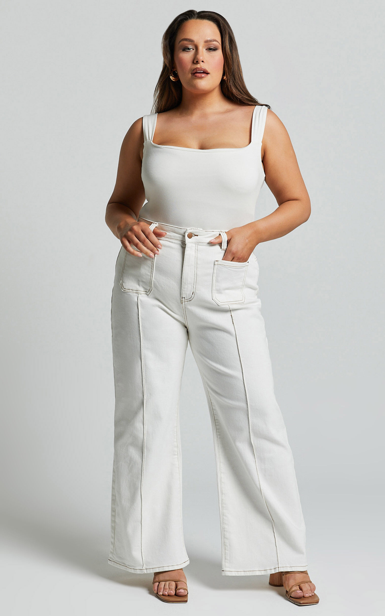 Malcolm Jeans - Mid Rise Contrast Stitch Flared Denim Jeans in White ...