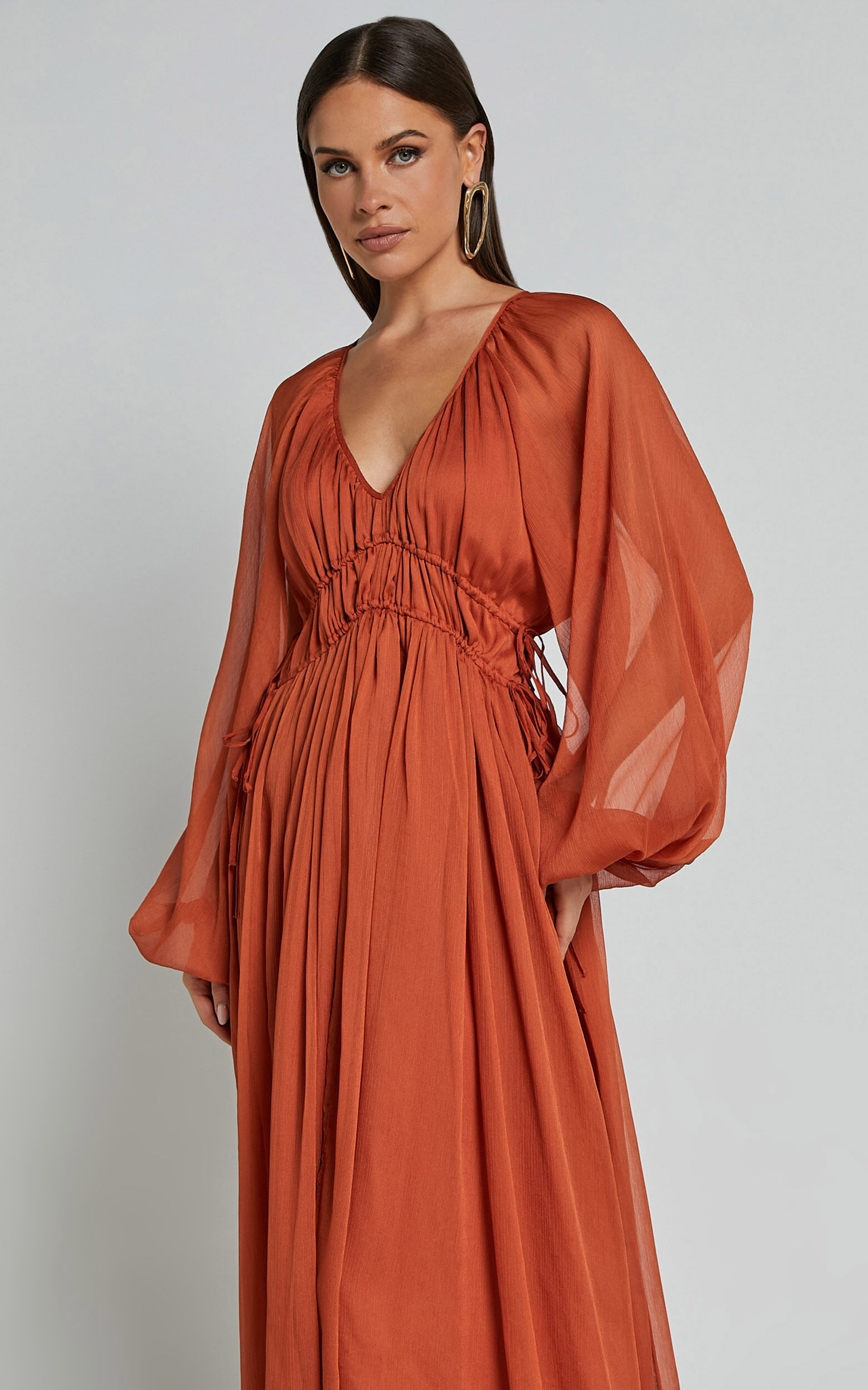 Rust colored long sleeve dress top