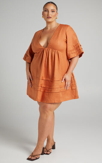 Amalie The Label - Leilo Linen Open Back Tuck Detail Skater Mini Linen Dress in Rust