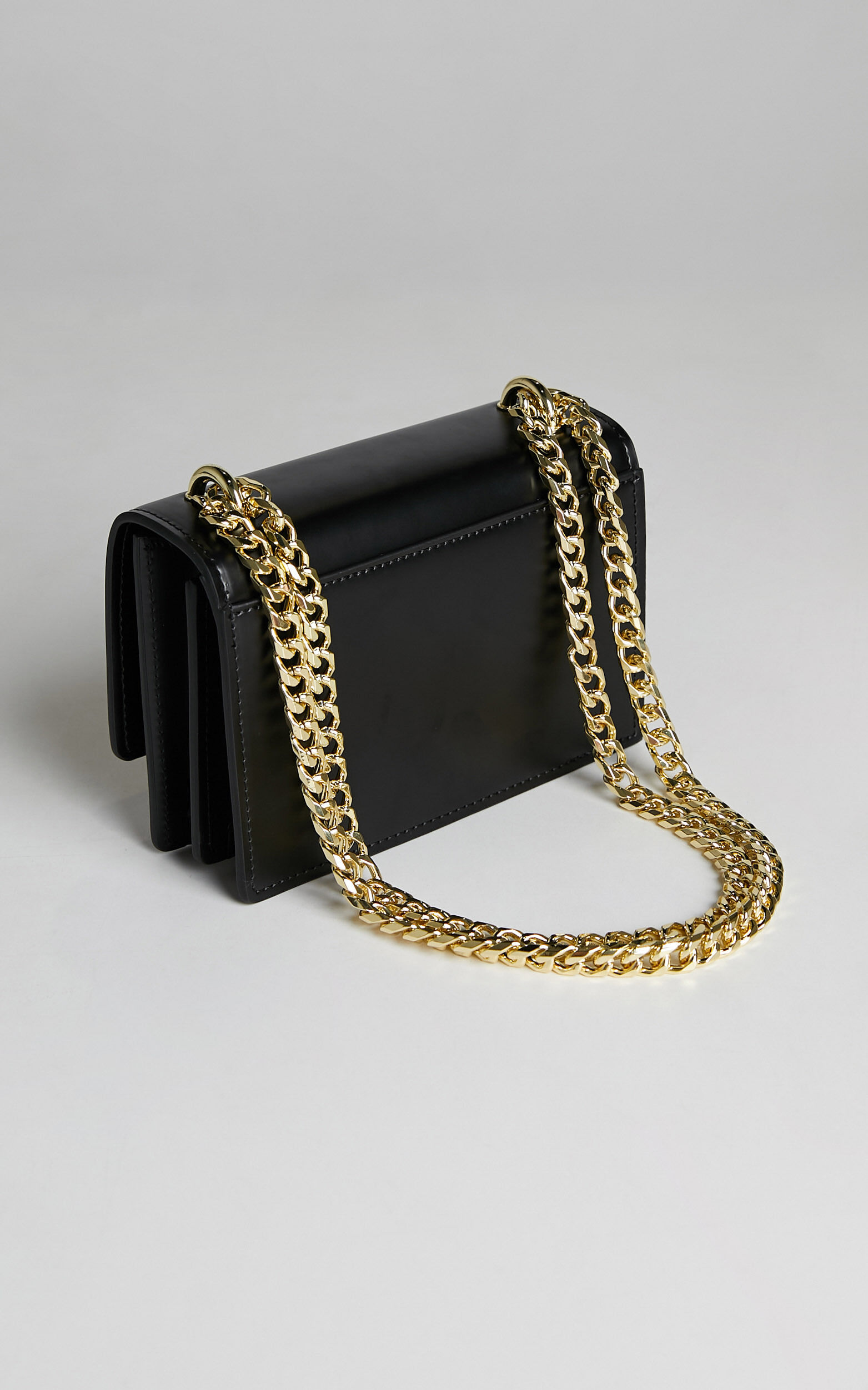 The regis shop gold side bag