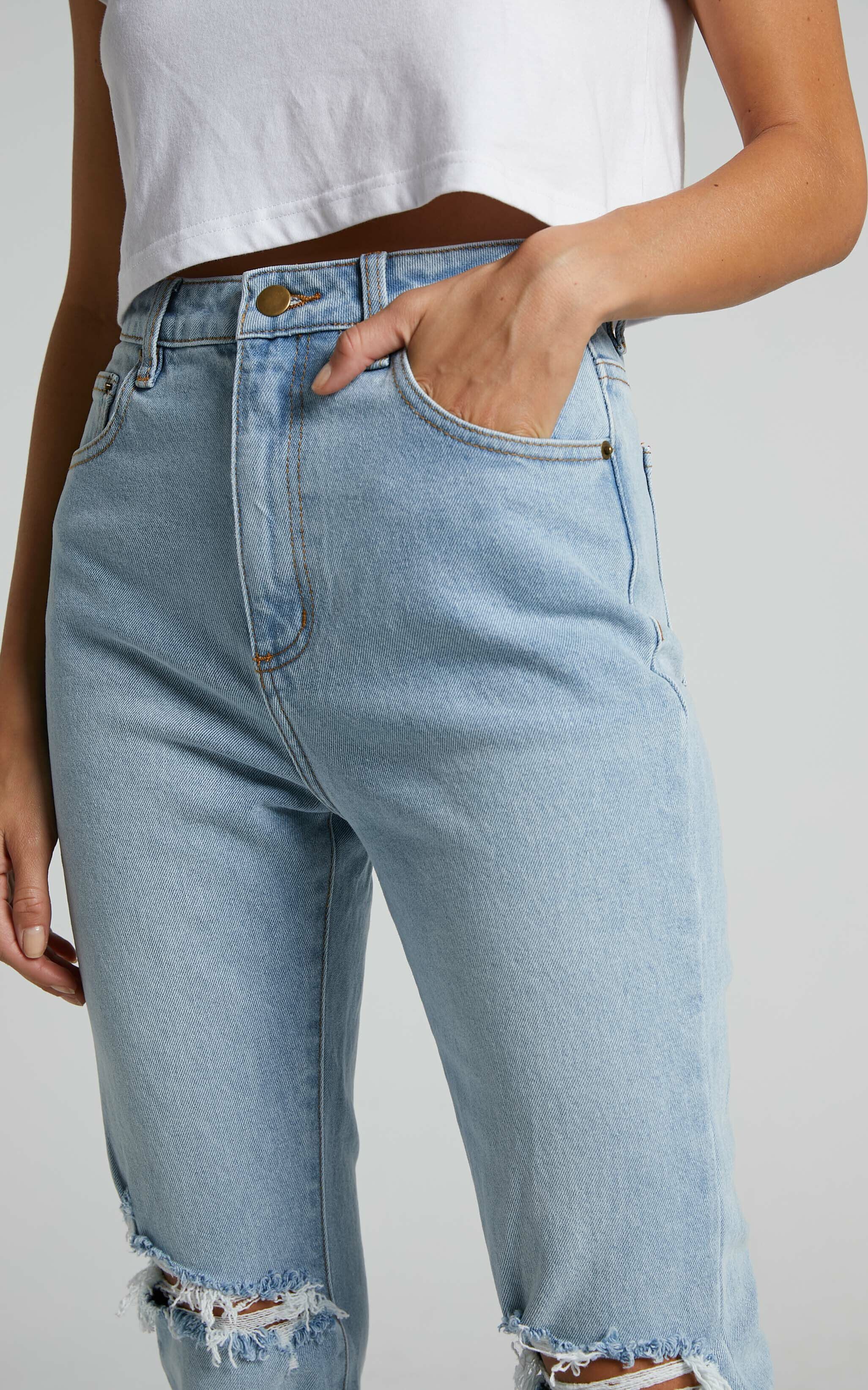 Izira Jeans High Waisted Ripped Denim Mom Jeans in Mid Blue Wash