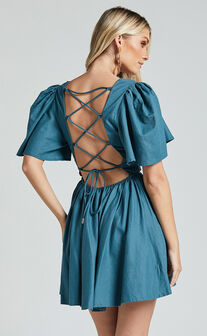 Amalie The Label - Chamika Linen Blend Plunge Open Tie Back Mini Dress in Teal