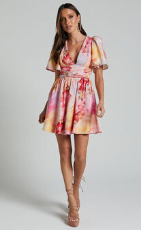 Amalie The Label - Chamika Linen Blend Plunge Open Tie Back Mini Dress in Marsielle Print