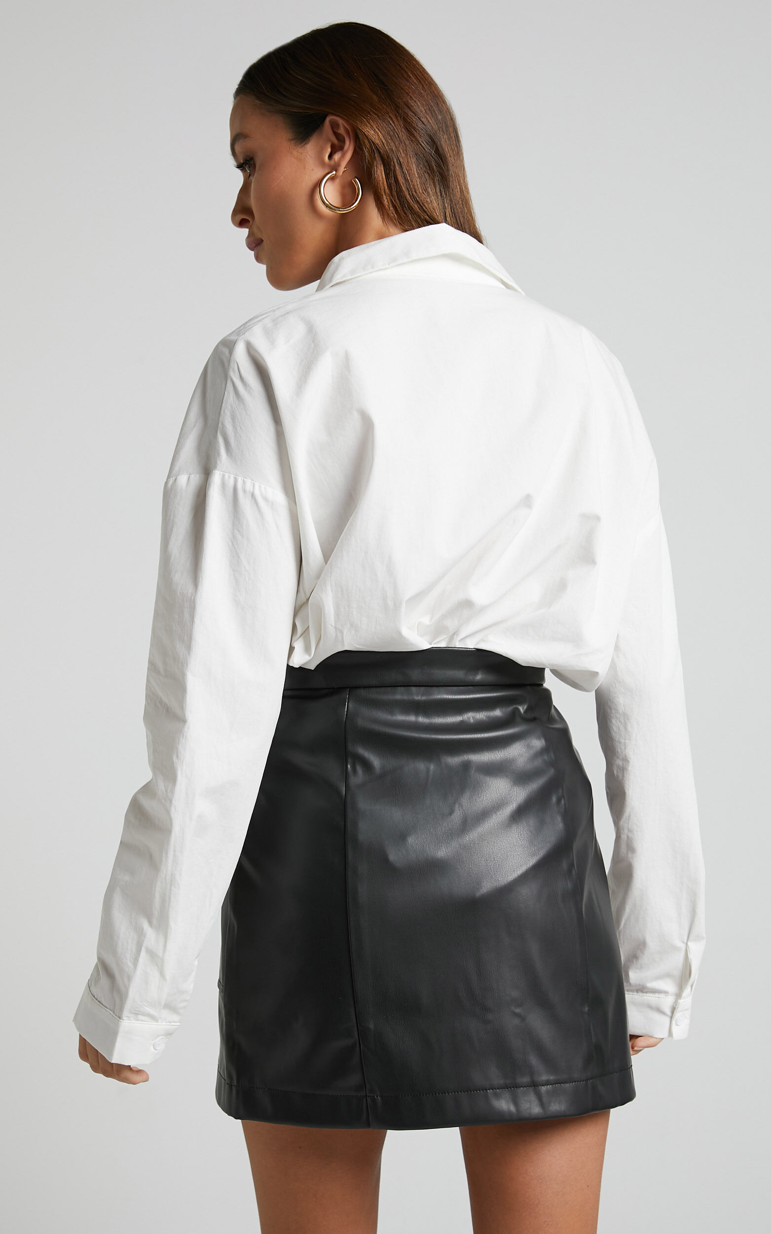 Elviera Mini Skirt A Line Zip Faux Leather Skirt in Black Showpo