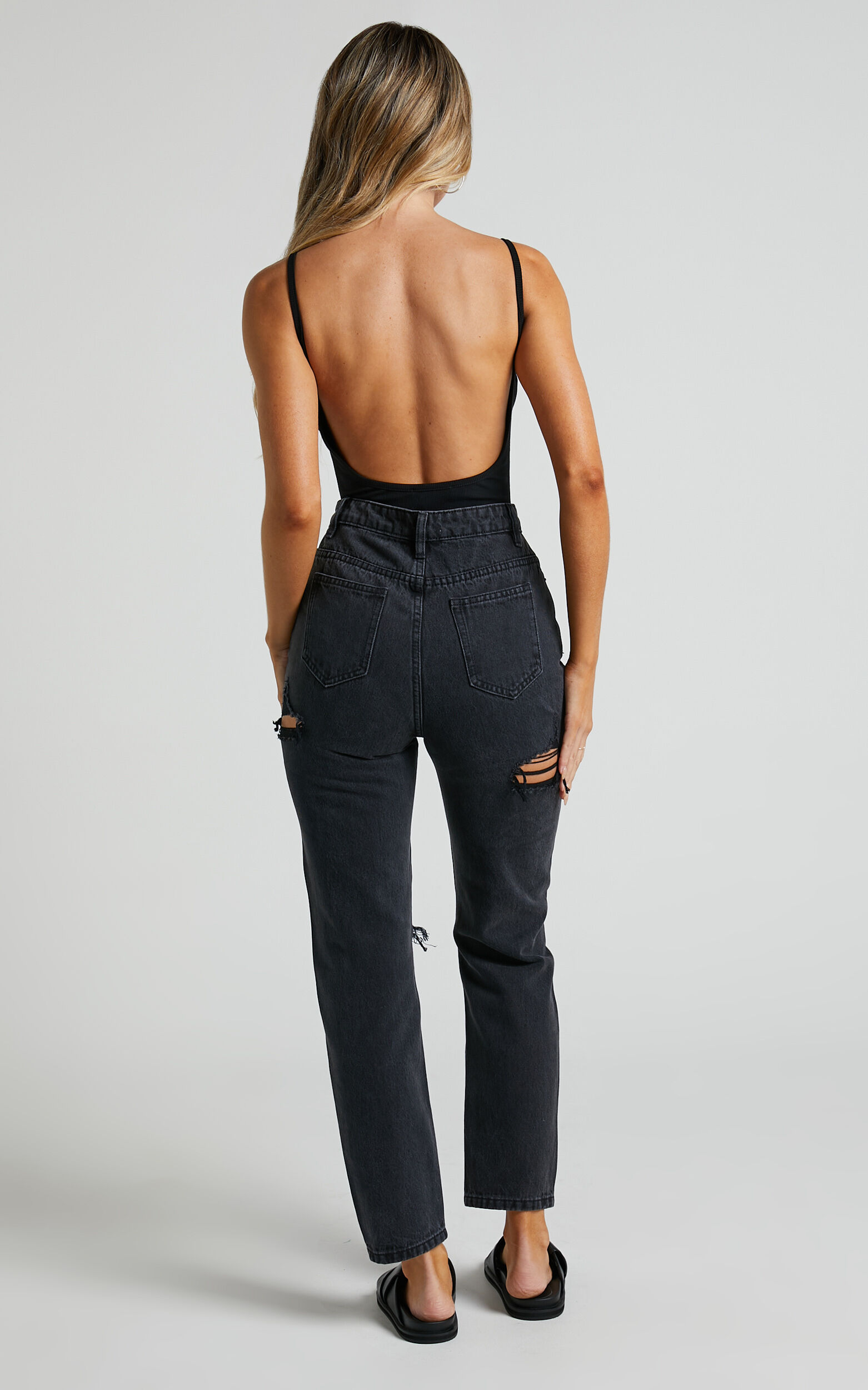 Distressed overall jeans sale