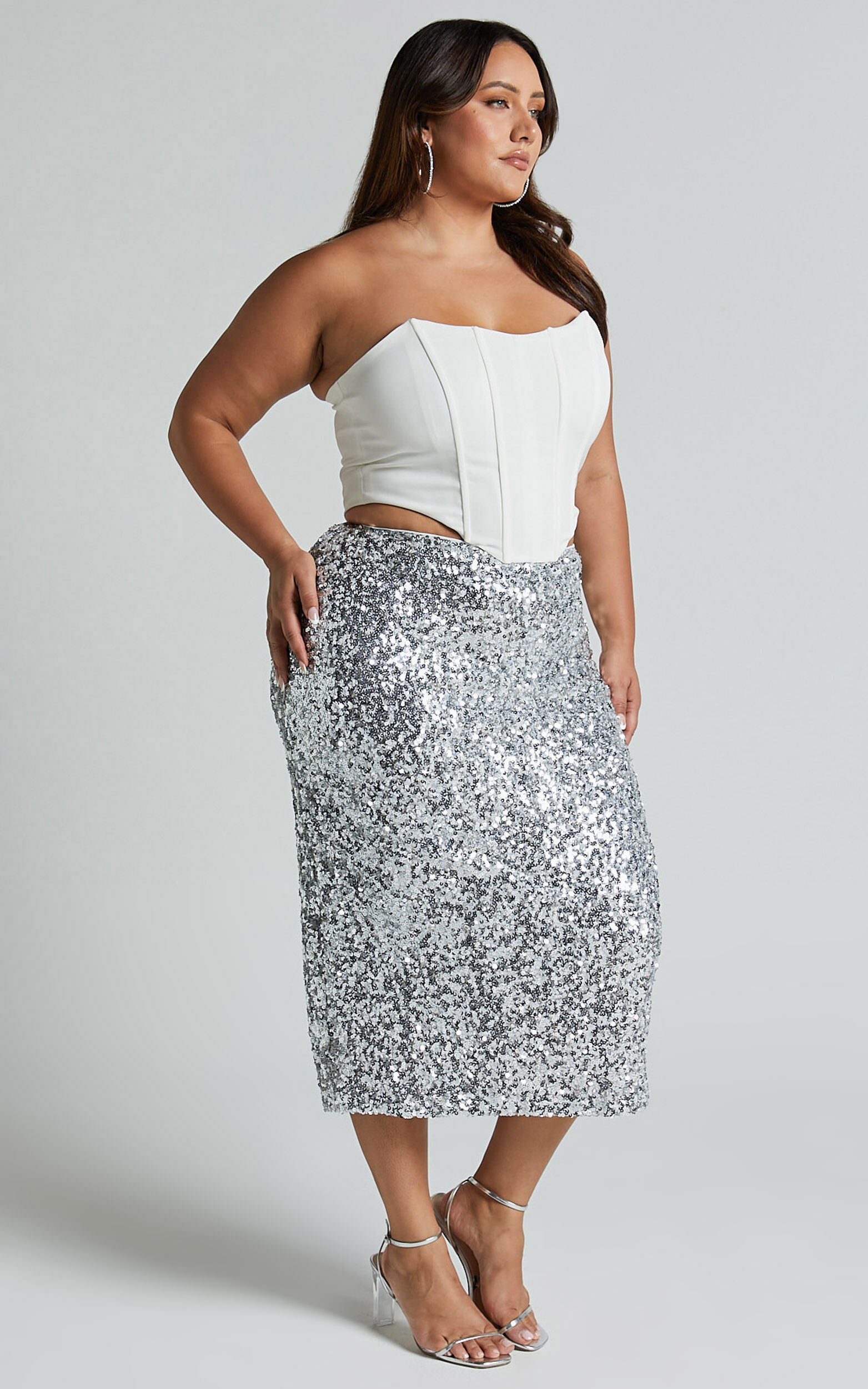 Plus size sequin top skirt history