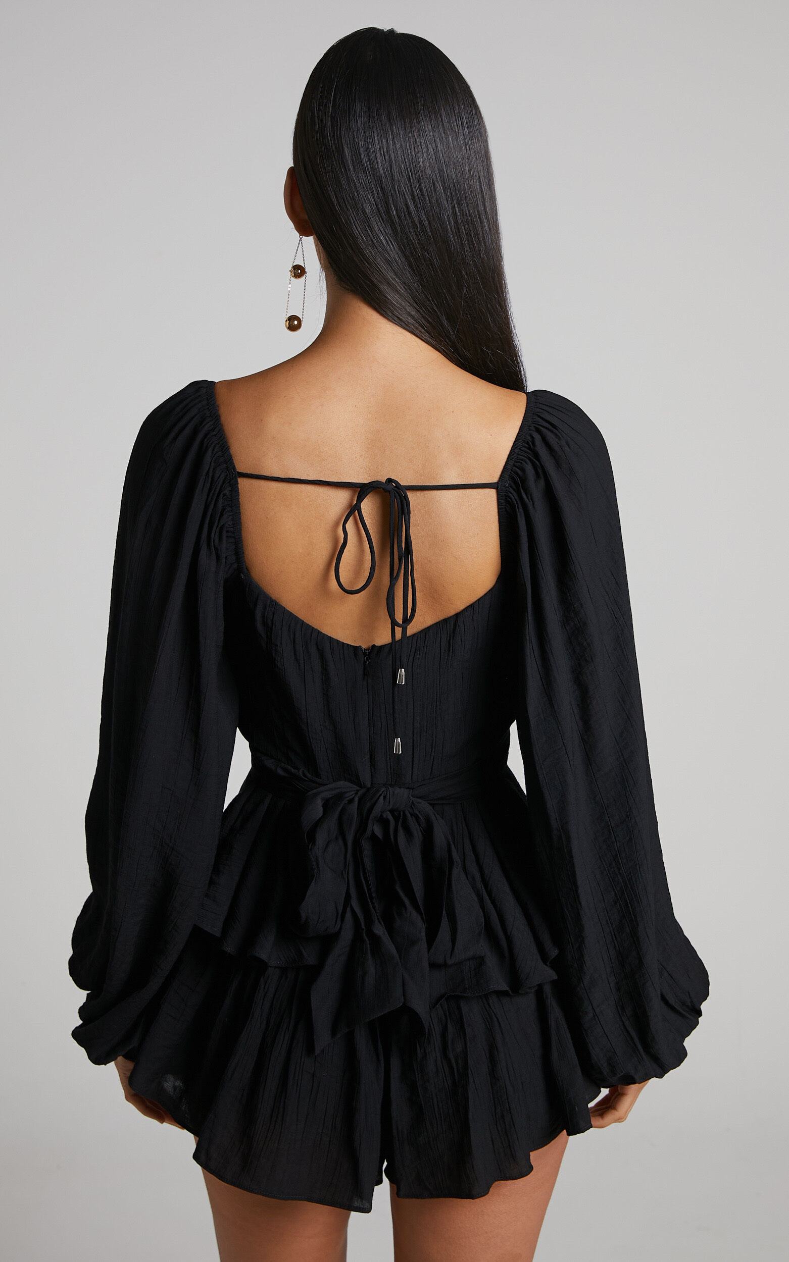 Black top ruffle playsuit