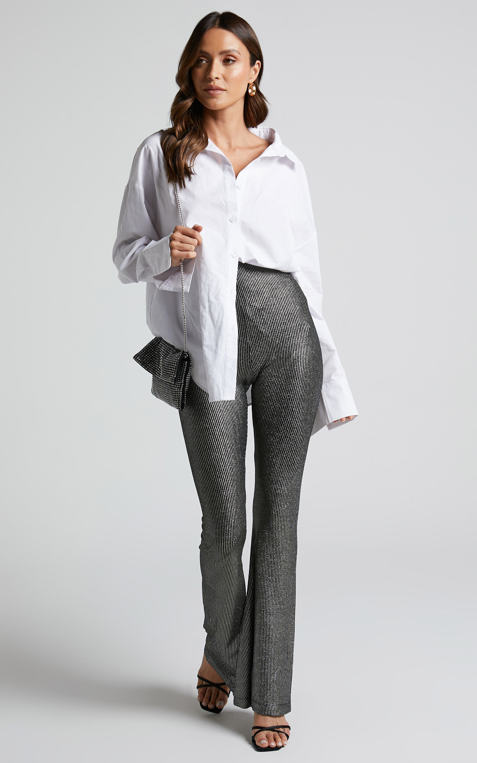 Lurex-knit flared trousers - Woman