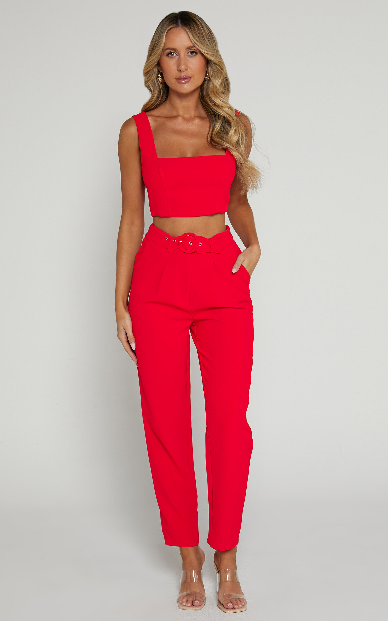 https://images.showpo.com/dw/image/v2/BDPQ_PRD/on/demandware.static/-/Sites-sp-master-catalog/default/dwb04f0070/images/reyna-two-piece-tailored-pant-set-with-crop-top-SC22040022/Reyna_Two_Piece_Set_-_Crop_Top_and_Tailored_Pants_in_Red_2.jpg?sw=1563&sh=2500
