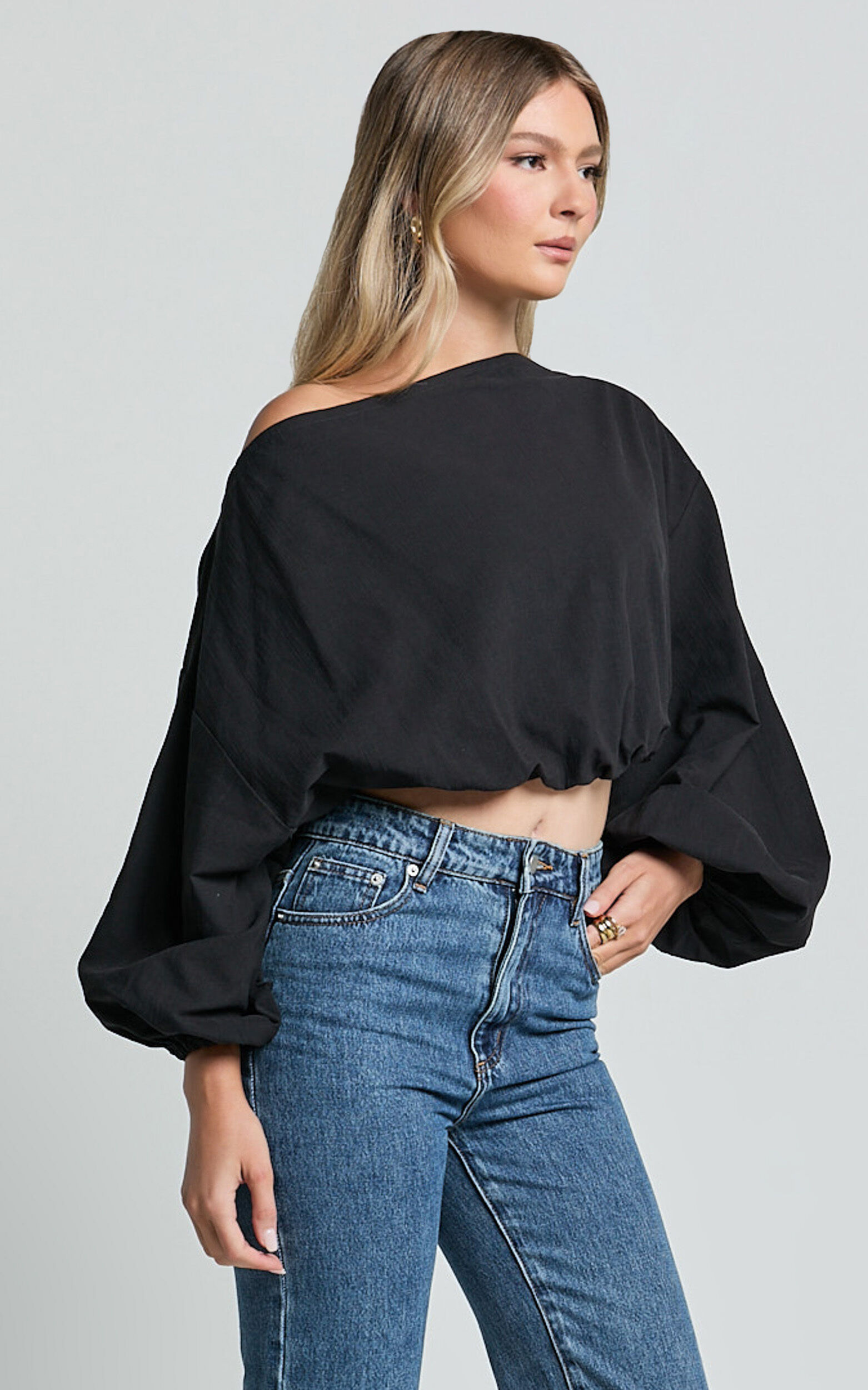 Alesia Top Asymmetrical Boat Neck Elastic Hem Crop Top in Black