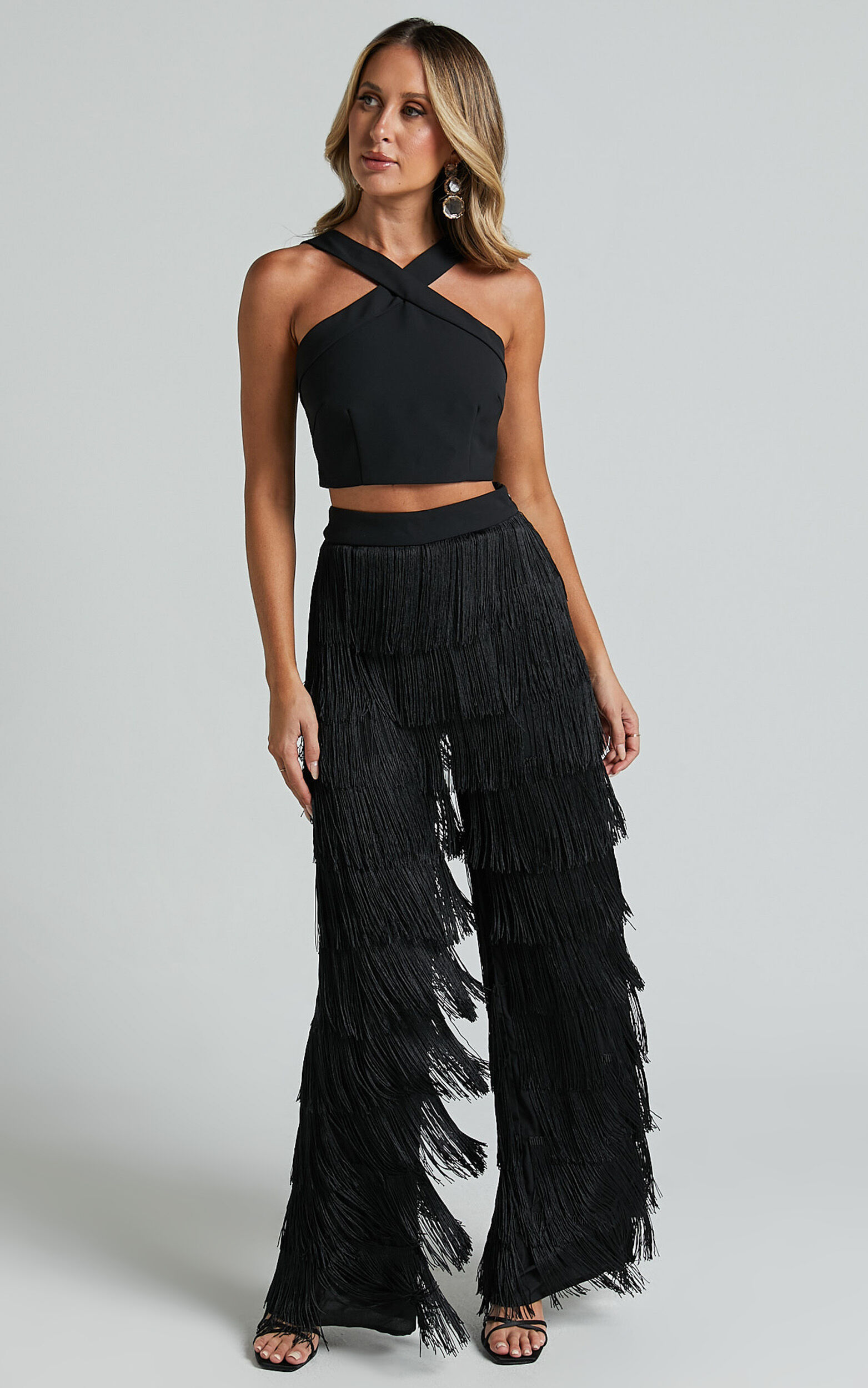 Caralyne Two Piece Set - Diamond Neck Crop Top and Tiered Fringe Pants in  Black
