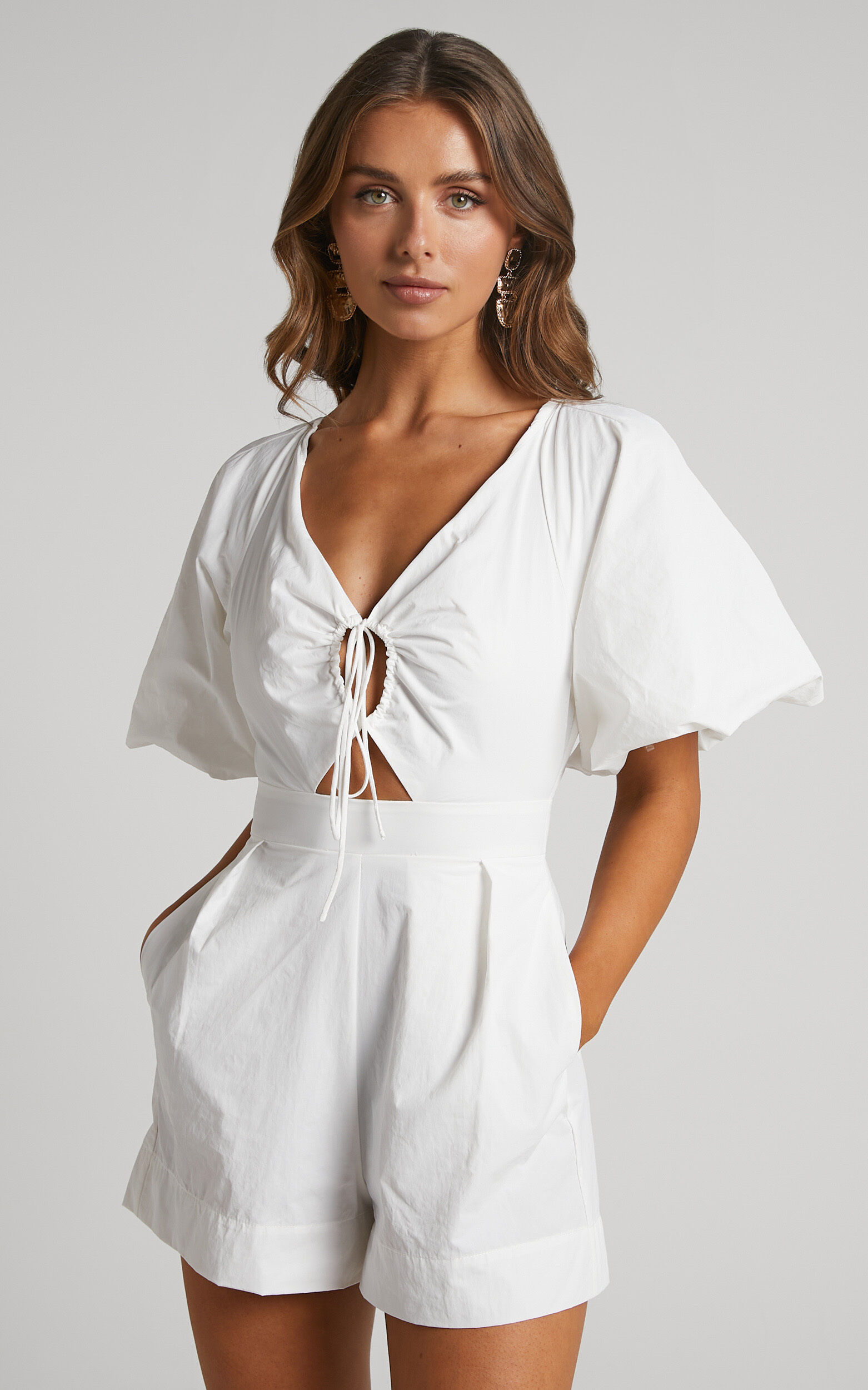 Khirara Playsuit Tie Front Cut Out Puff Sleeve Playsuit in White Showpo