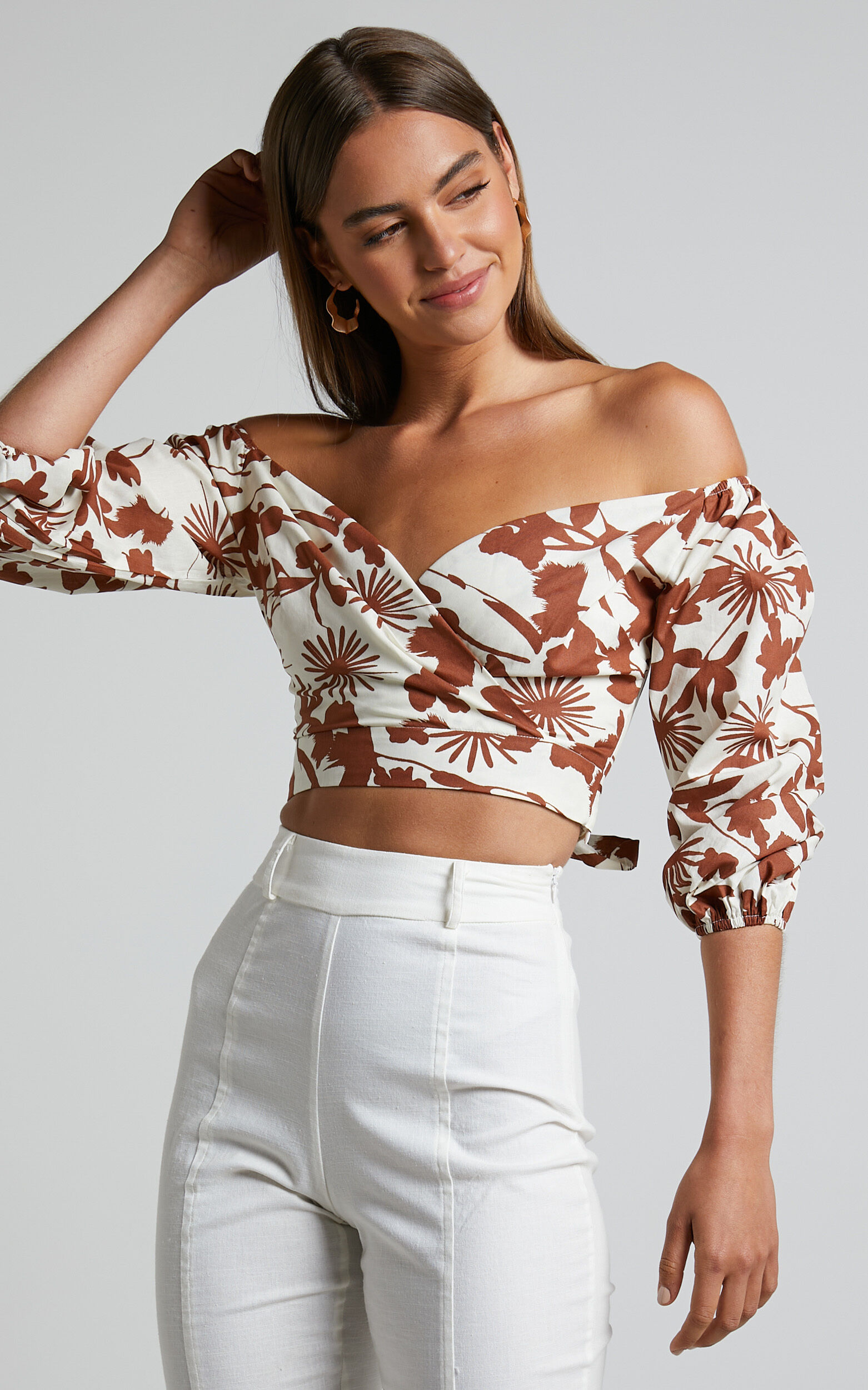 Off shoulder cross store wrap top