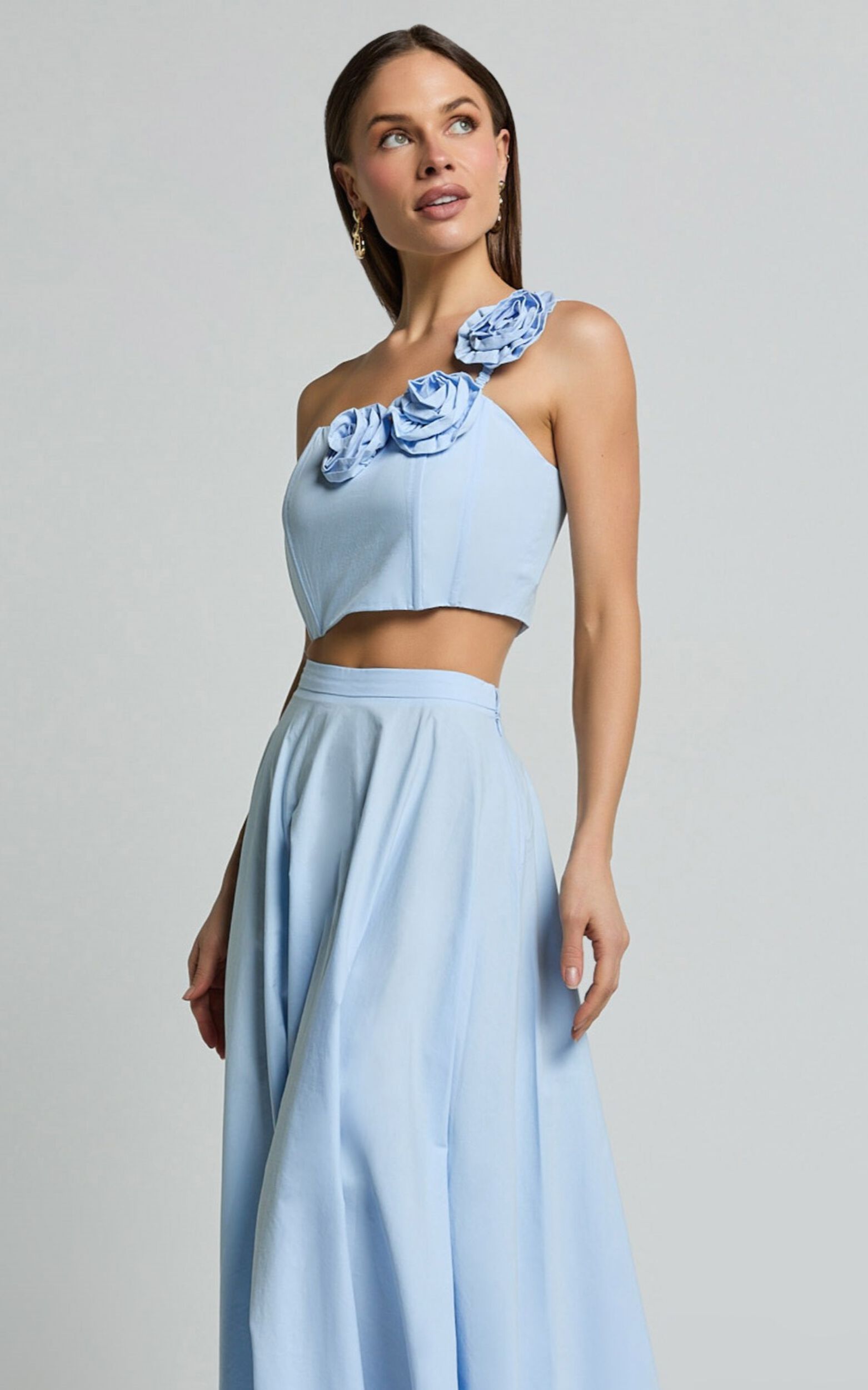 Claire Two Piece Set One Shoulder Rosette Detail Crop Top And A Line Skirt Set in Powder Blue Showpo