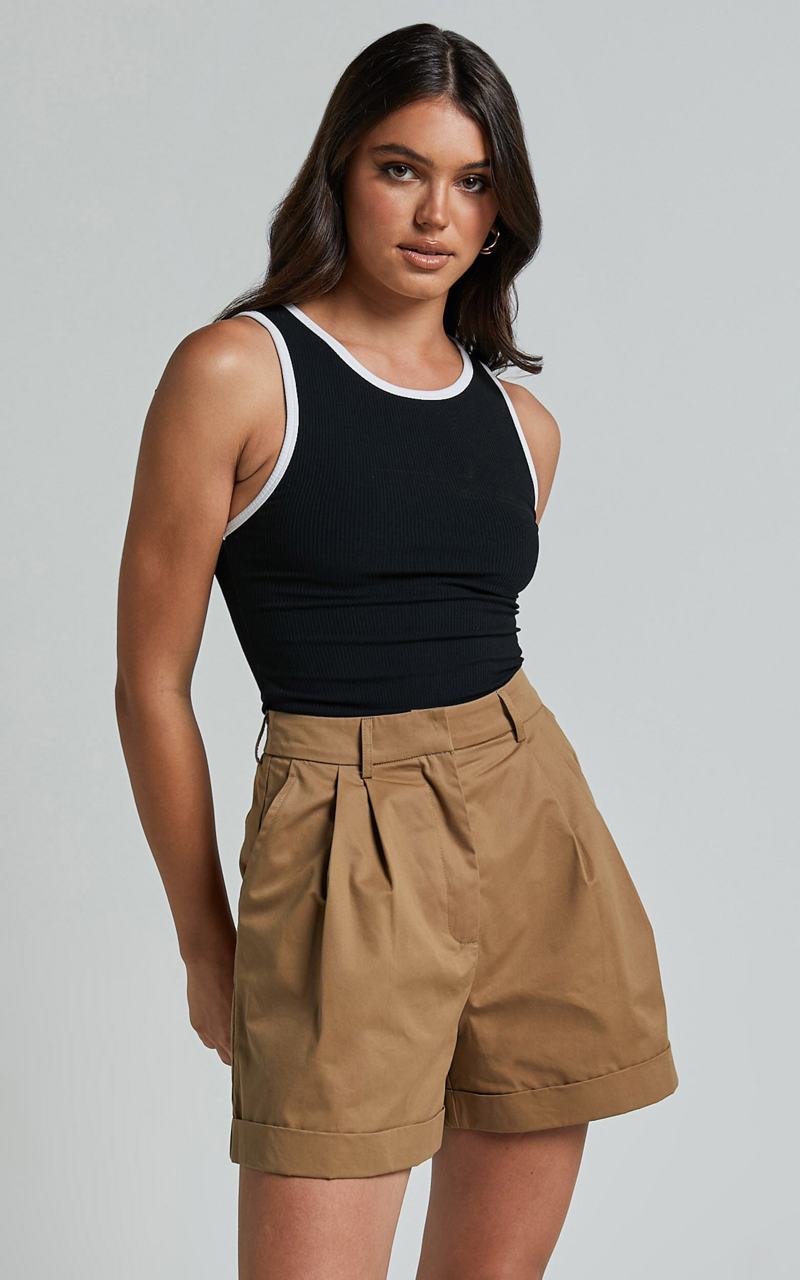 Khaimy Shorts High Waisted Cuffed Shorts in Tan
