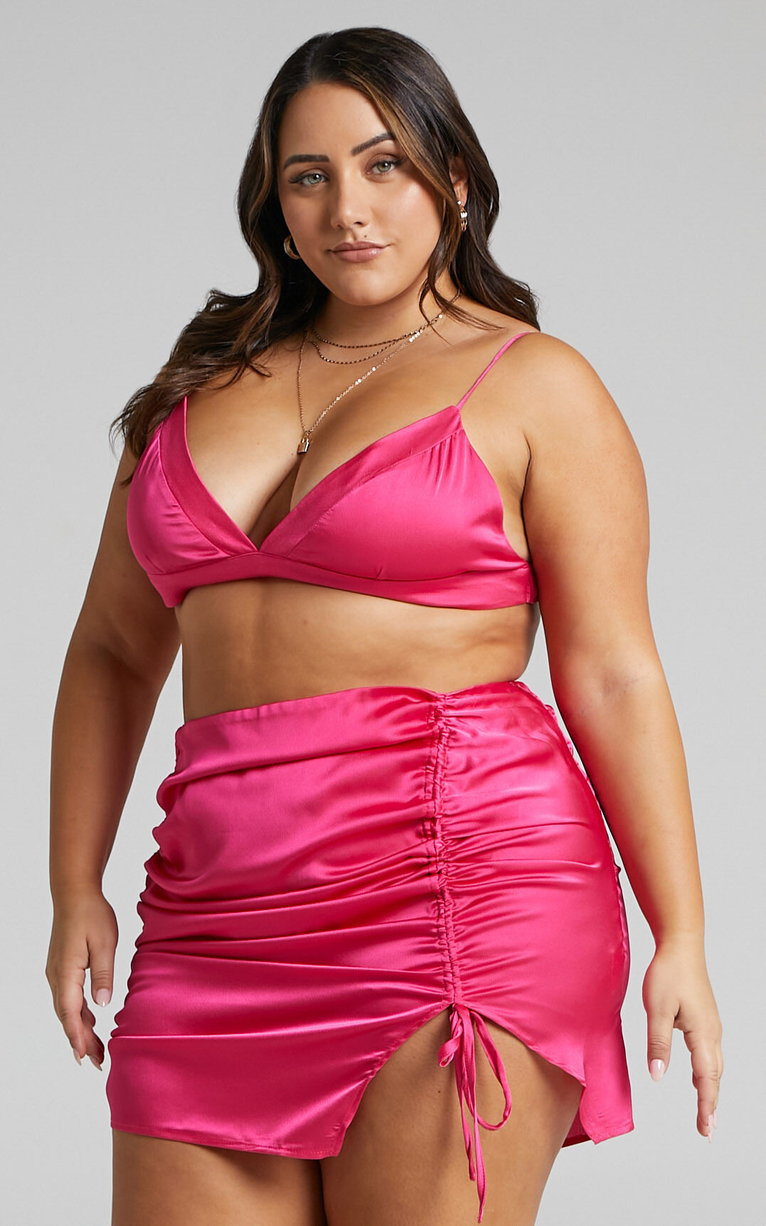 Satin mini skirt with split outlet